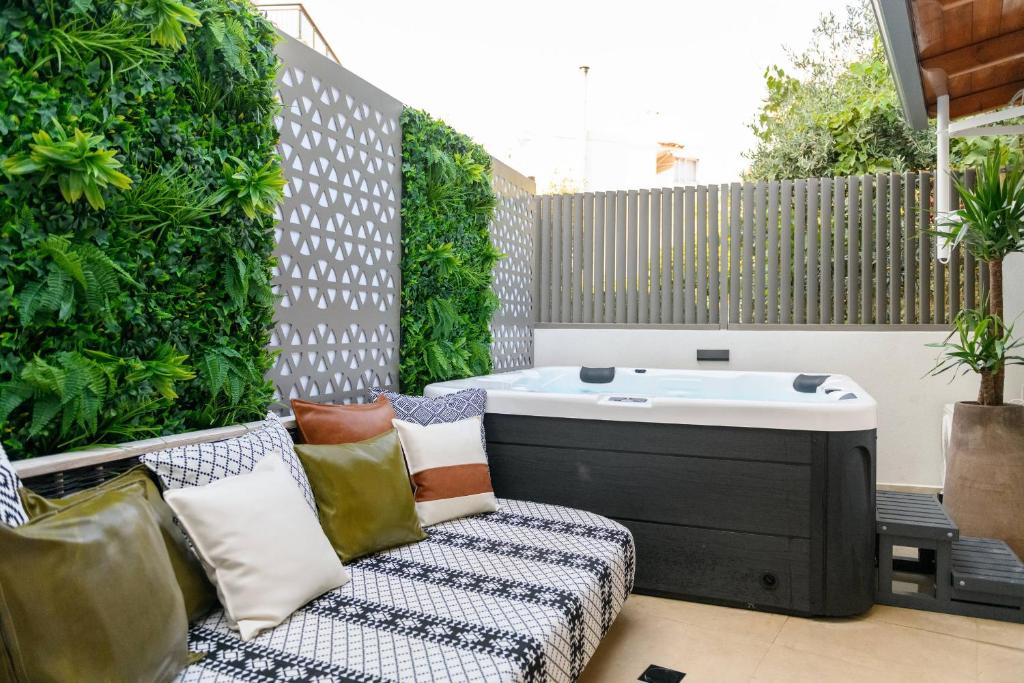 Sentio Thassos Suites exterior with garden and jacuzzi