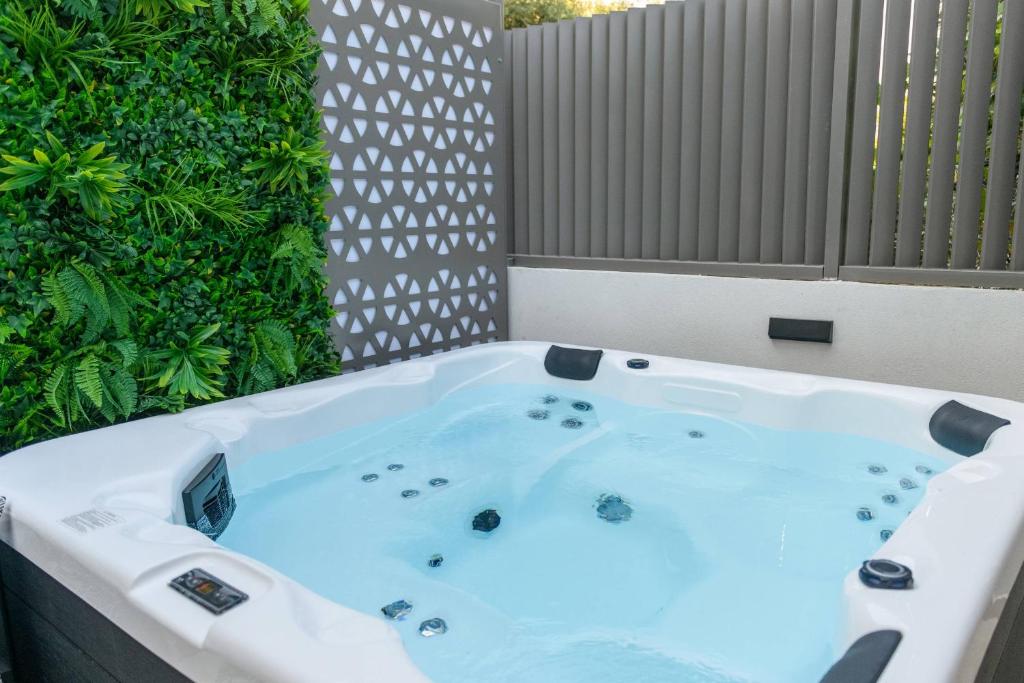 Sentio Thassos Suites exterior with garden and jacuzzi