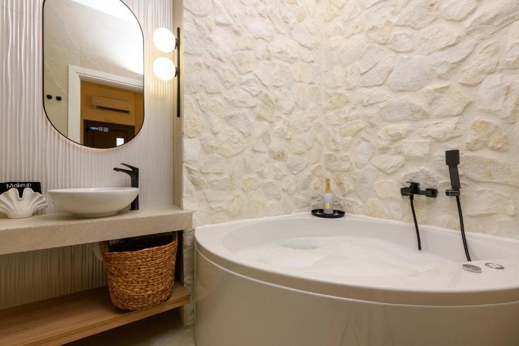 Sentio Thassos Suites exterior with garden and jacuzzi