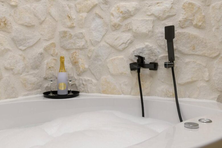 Sentio Thassos Suites exterior with garden and jacuzzi